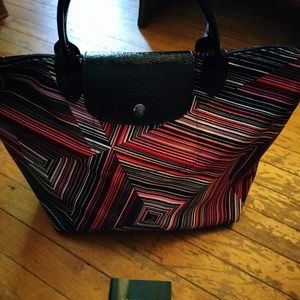 Nee longchamp with patent leather,never used have tag but not attached